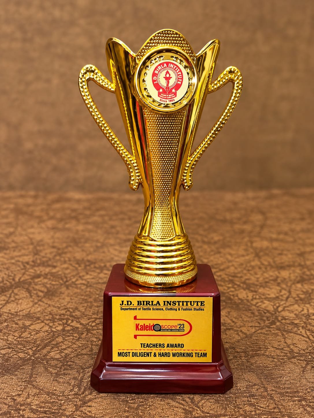 Kaleidoscope '23 Teachers Award trophy from J.D. Birla Institute